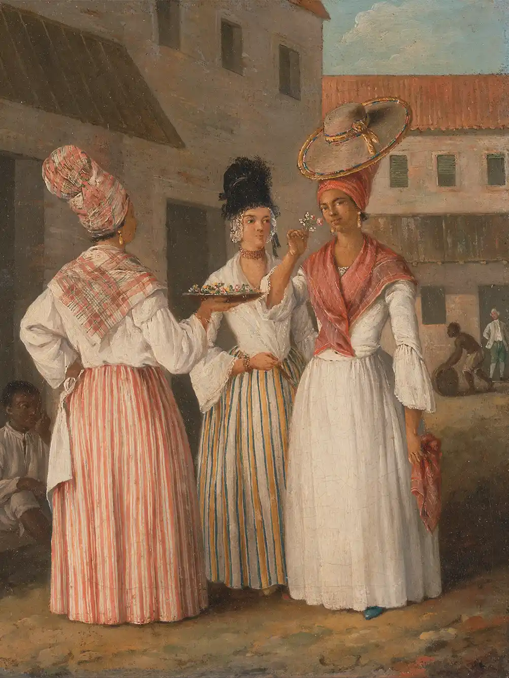 Drei Frauen in bunten, gestreiften Kleidern unterhalten sich auf einer sonnenbeschienenen Straße; eine trägt einen Korb auf dem Kopf.